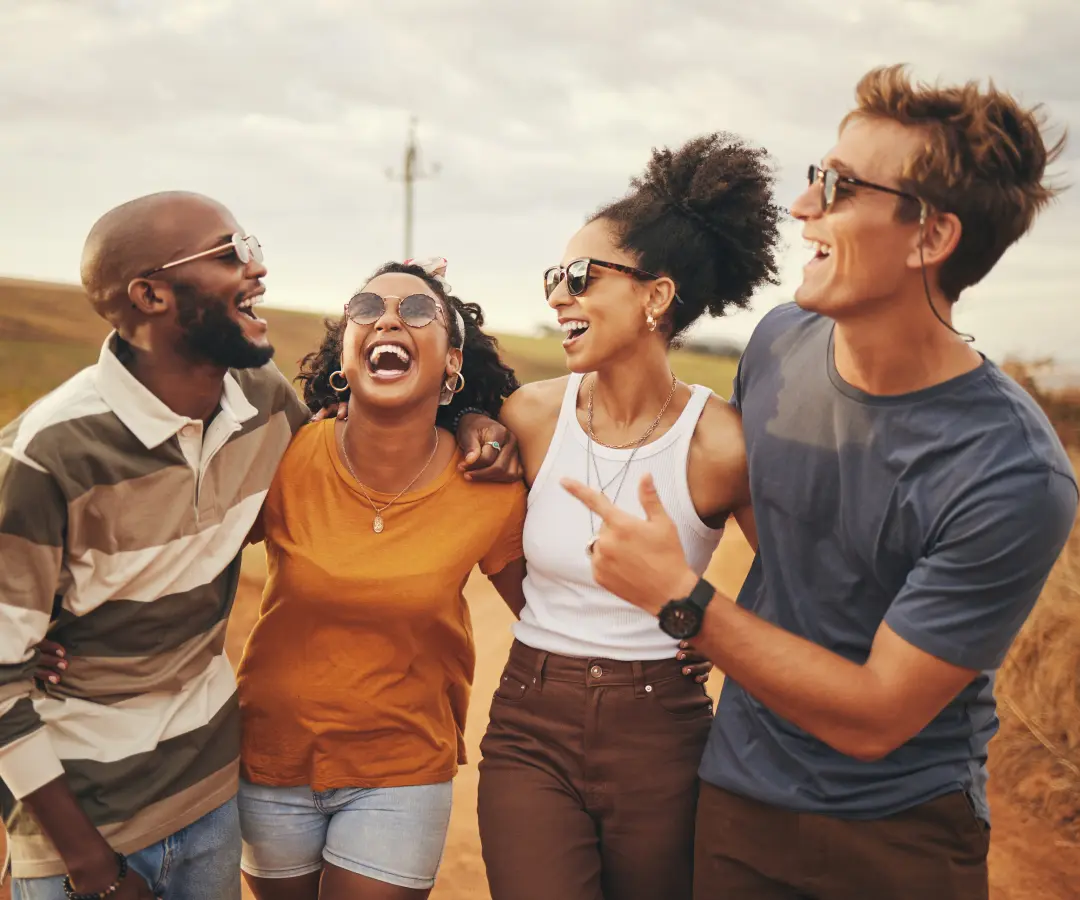 A group of happy people using an instant translator device, demonstrating the effectiveness of live translation and voice translation.